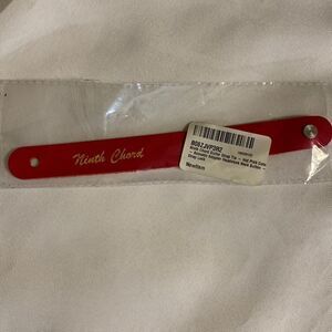Ninth chord guitar strap tie. Hot pink